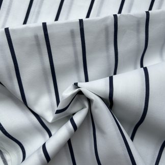 Algodón blanco lineas azules